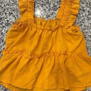 Yellow ruffled cropped shirt